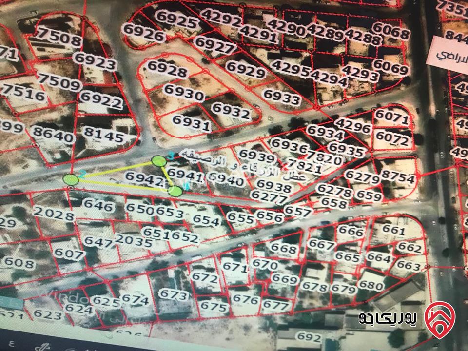 قطعتين ارض مساحة 860م / 580م للبيع في الزرقاء - الزواهرة