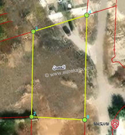 ارض 978م للبيع في اربد - من اراضي الحصن ضمن حوض الحبيس 