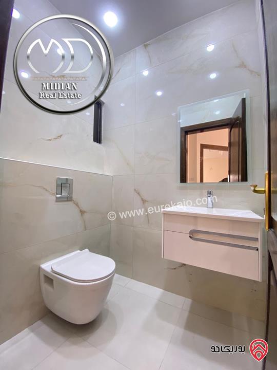 شقة ارضية فارغة للايجار في عمان - خلدا العوجانية مساحة 190م مع ترس و حديقة 120م تشطيبات و ديكورات عصرية فاخرة