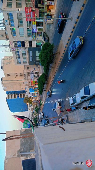 قطعة أرض مساحة 785م عليها مبنى تجاري للبيع في عمان - تلاع العلي