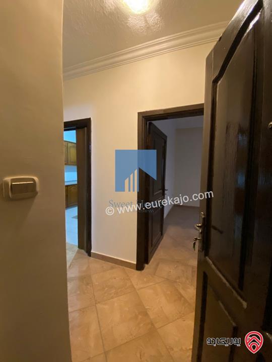 شقة مميزة طابق ارضي معلق 135م تشطيب سوبر ديلوكس للبيع في عمان - خلدا