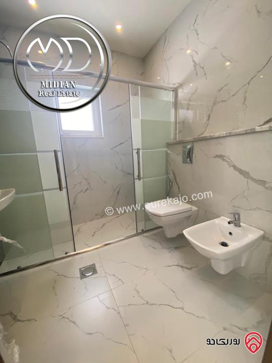 شقة أرضية للبيع في عمان - خلدا مساحة 185م مع ترس 40م تشطيبات سوبر ديلوكس جديدة لم تسكن بسعر مميز