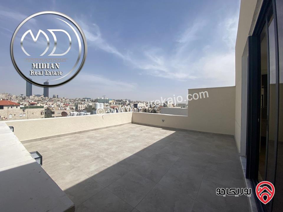 شقة دوبلكس طابق اخير مع روف للبيع في عمان - ام اذينة مساحة 205م مع تراسات تشطيبات و ديكورات فاخرة اطلالة جميلة