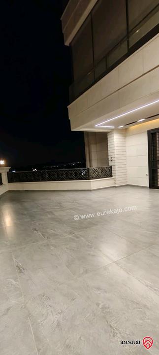 شقة طابق ارضي جديدة فاخرة للبيع في عمان - مرج الحمام دوار الاتصالات مساحة 204 متر مع ترس خارجي 100 متر بسعر مغري جدا 