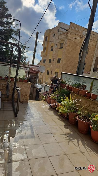 شقة مميزة طابق أرضي مساحة 143م مع مساحات خارجية للبيع في عمان - تلاع العلي