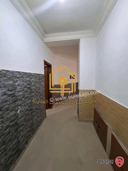 شقة فارغة طابق تسوية 100م للإيجار في عمان - تلاع العلي 