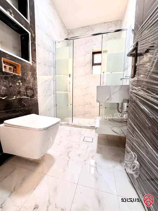 شقة مساحة 125م طابق ثاني للبيع اقساط بسعر الكاش في عمان - طبربور 