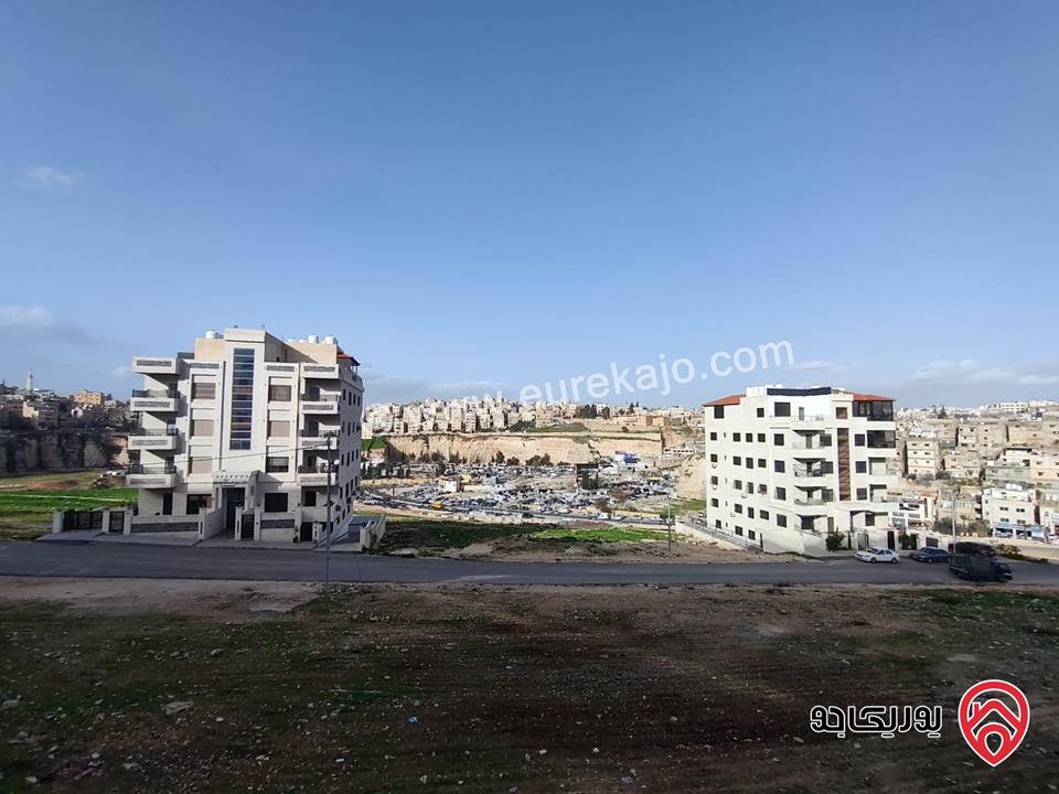 شقة ارضية مساحة 135م للبيع في عمان - جبل الزهور          	 