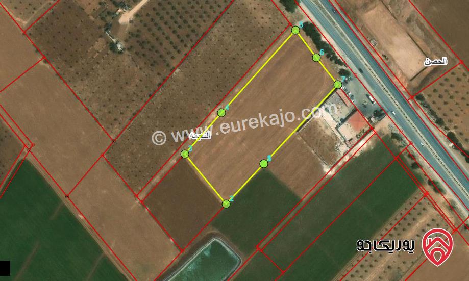 قطعة ارض تجارية مساحة 10639م للبيع في اربد غرب جسر النعيمة 