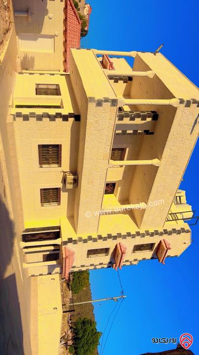 منزل مفروش مساحة الأرض 10 دونم والبناء 500م للايجار في جرش أم قنطره