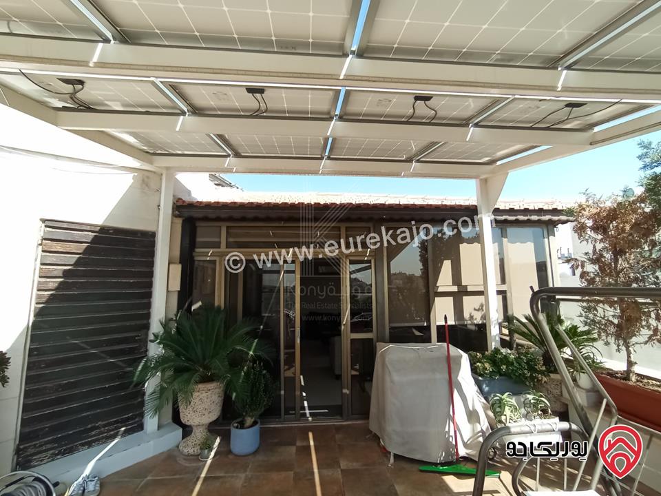 شقة فاخرة طابق أخير مع روف مساحة 211م للبيع في عمان - خلدا مع اطلالة مميزة