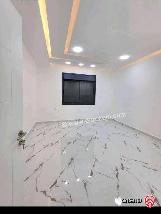 شقة طابق أول هندسي و رووف اطلالة بحرية مساحة 175 م² للبيع في العقبة - السكنية الخامسة تشطيب هايبر ديلوكس 