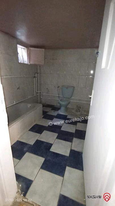 شقة مساحة 110م طابق تسوية للبيع في عمان - جبل التاج إشارات حي ام تينة والتاج شارع السيراوية 