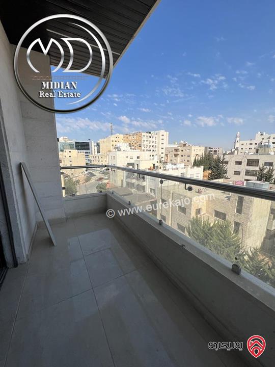 شقة دوبلكس طابق اخير مع روف للبيع في عمان - خلدا مساحة 150م مع تراس بسعر مميز جداً