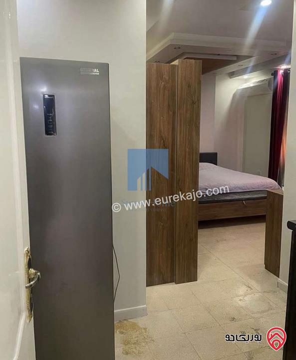 شقة مميزة شبه أرضية مساحة 130م للبيع في عمان - خلدا