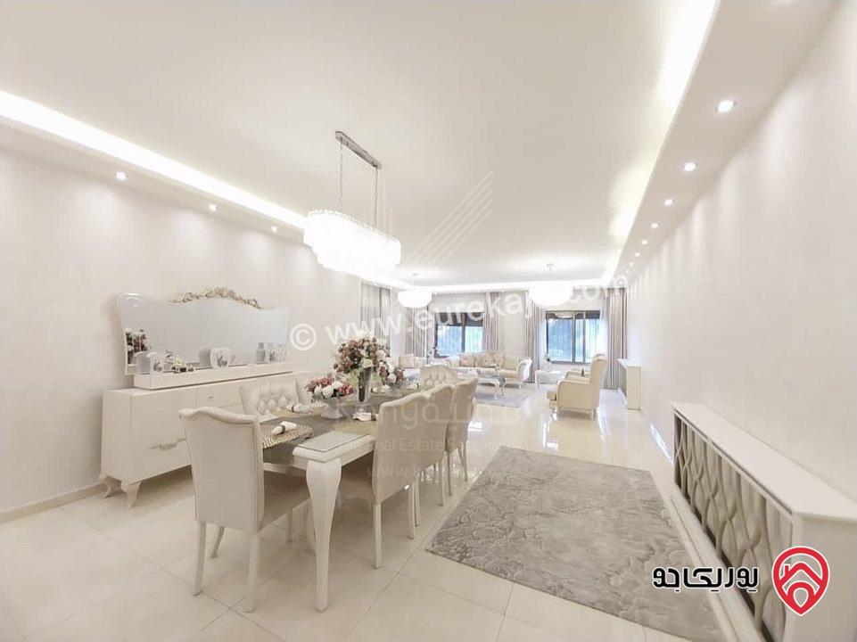 شقة فاخرة طابق شبه ارضي مساحة 383م للبيع في عمان - عبدون