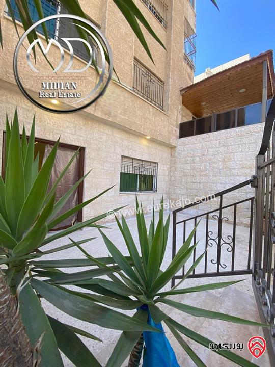 شقة ارضية للبيع في عمان - الجاردنز مساحة 170م مع ترس و حديقة 250م تشطيبات و ديكورات فاخرة بسعر مميز جداً