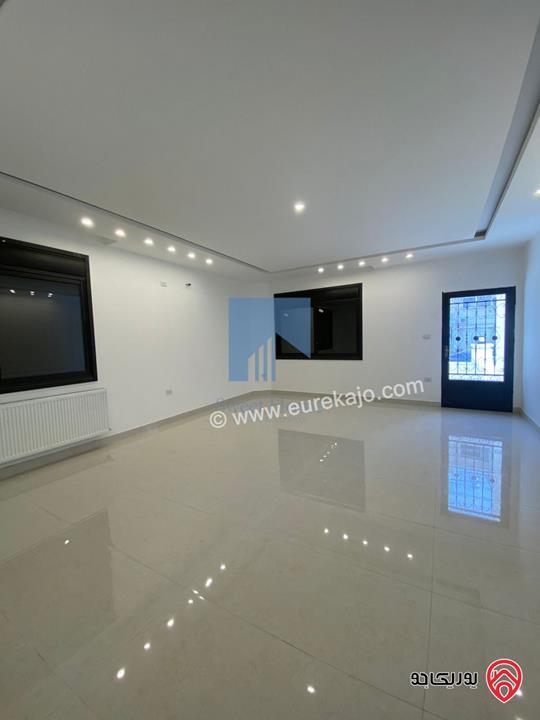 شقة أرضية فاخرة للبيع في عمان - الجندويل قرب المتصرفية 170م مع ترس 50م لم تسكن بسعر مغري