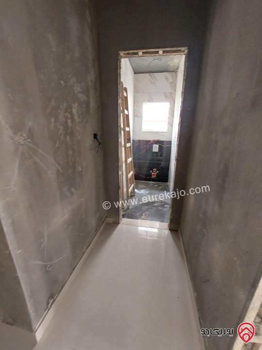 شقة أرضية قيد التشطيب مساحة 170م داخلي و 180م خارجي للبيع في عمان - تلاع العلي