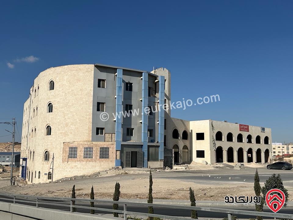أرض مساحة 6 دونم و 775م عليها مجمع صناعي تجاري مساحة 10 دونم للبيع في عمان  - ماركا شارع الجيش