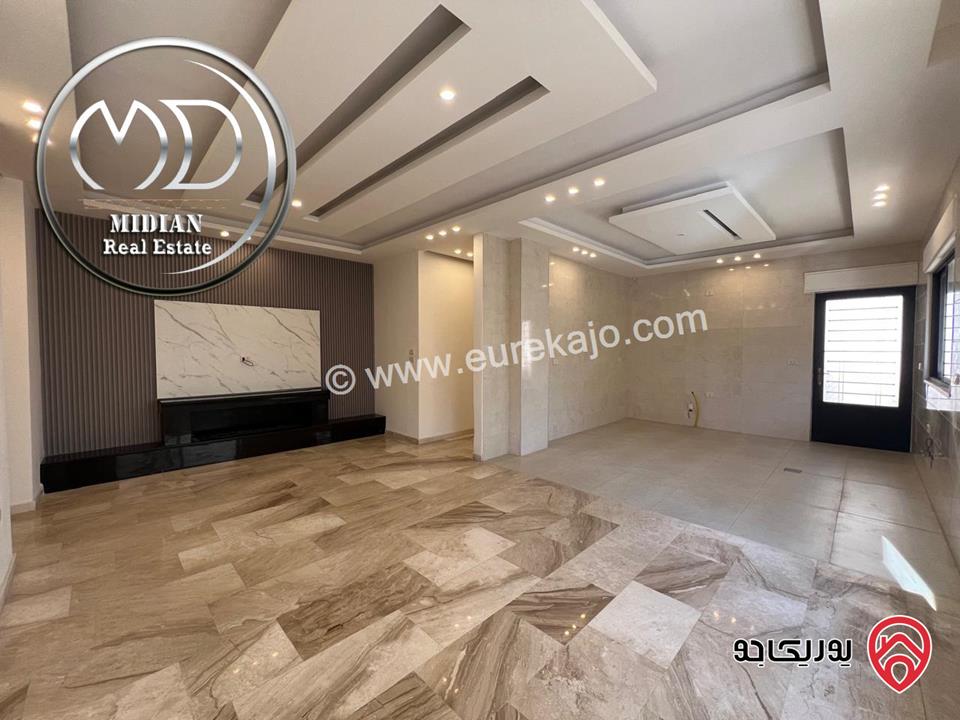 شقة ارضية للبيع في عمان - ضاحية النخيل مساحة 240م 4 نوم مع ترس 70م تشطيبات و ديكورات فاخرة جديدة لم تسكن
