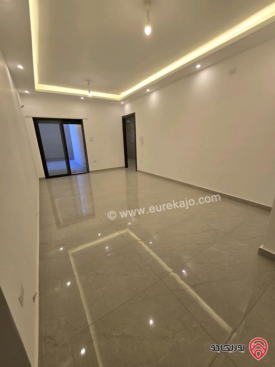 شقة أرضية مساحة 115م مع تراسات 90م للبيع في عمان - تلاع العلي