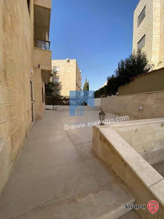 شقة أرضية (شبه فيلا) طابقية فاخرة للبيع في عمان - الرابية قرب الكالوتي 425م مع حديقة وترسات 500م