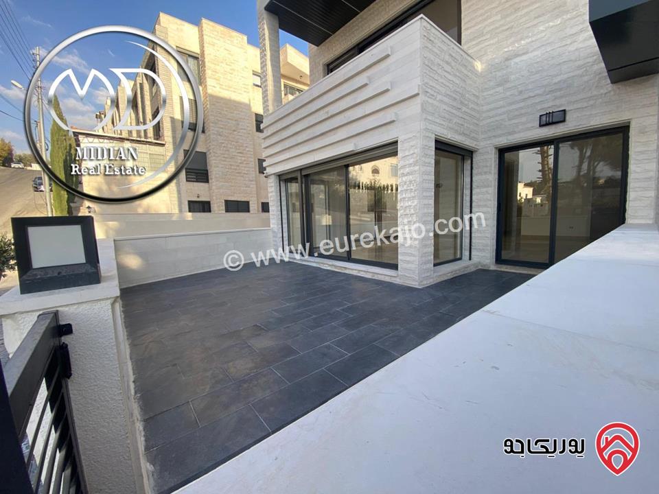شقة ارضية جديدة مساحة 225م مع ترس و حديقة 250م تشطيبات و ديكورات فاخرة جداً للبيع في عمان - خلدا مقابل دابوق