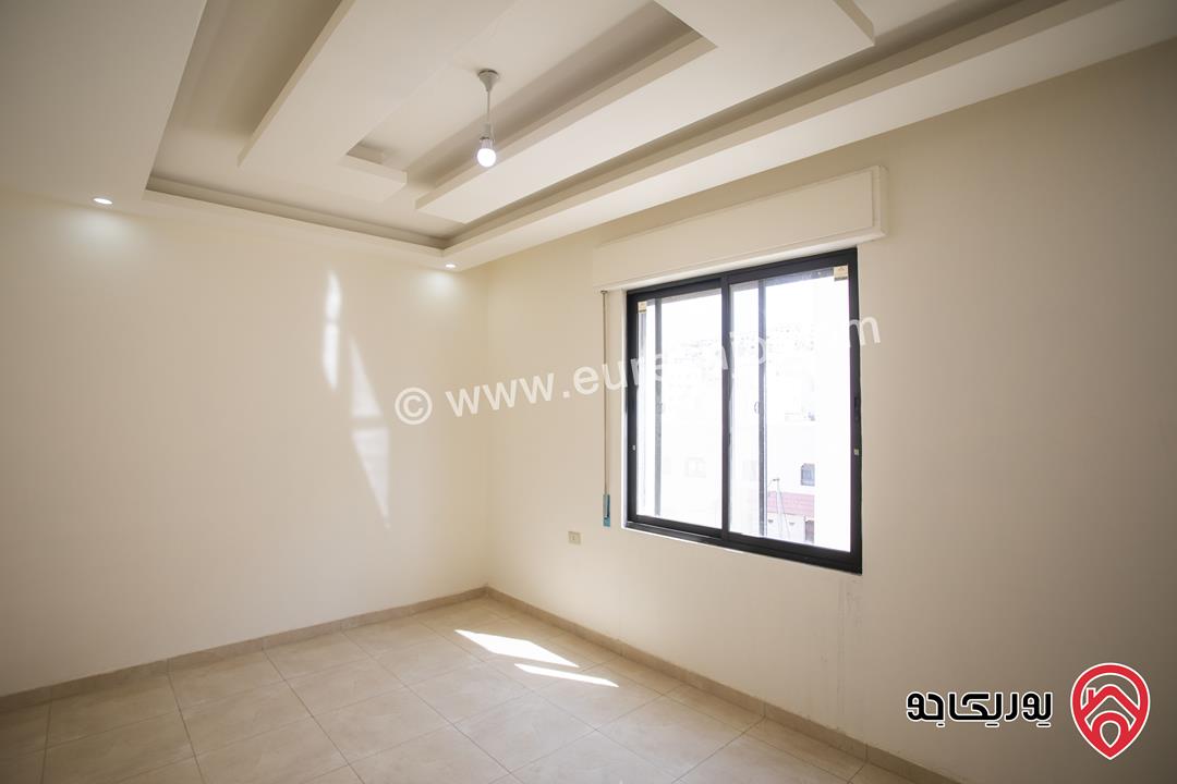 شقة طابق ثالث مع روف مساحة 135م للبيع في عمان - ابو علندا من المالك بسعر 50 الف 