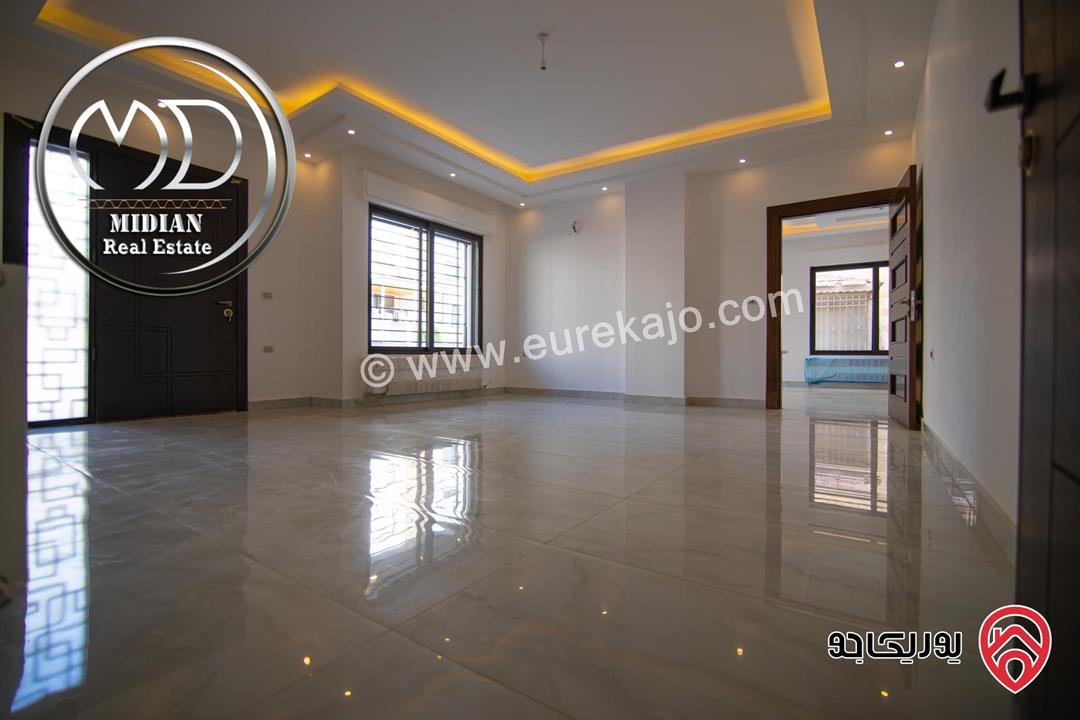 شقة أرضية جديدة للبيع في عمان - خلدا العوجانية مساحة 235م مع ترس 85م تشطيبات و ديكورات سوبر ديلوكس بسعر مميز