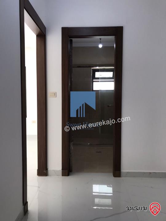 شقة فاخرة للبيع في عمان - خلدا قرب المدارس الإنجليزية 280م مع حديقة وترسات 320م لم تسكن