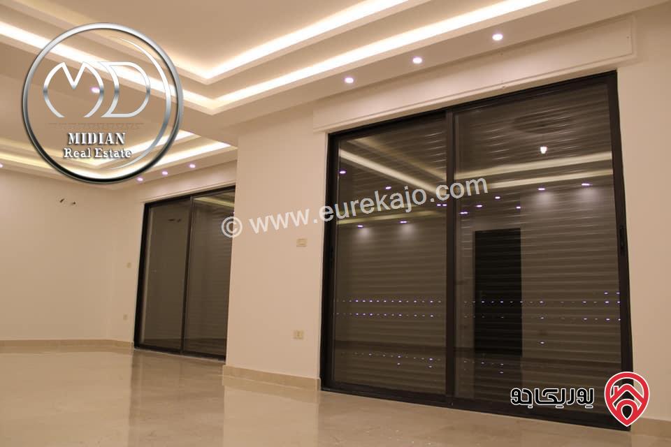 شقة ارضية جديدة للبيع في عمان - ضاحية النخيل مساحة 250م مع ترس و حديقة 150م تشطيبات و ديكورات سوبر ديلوكس