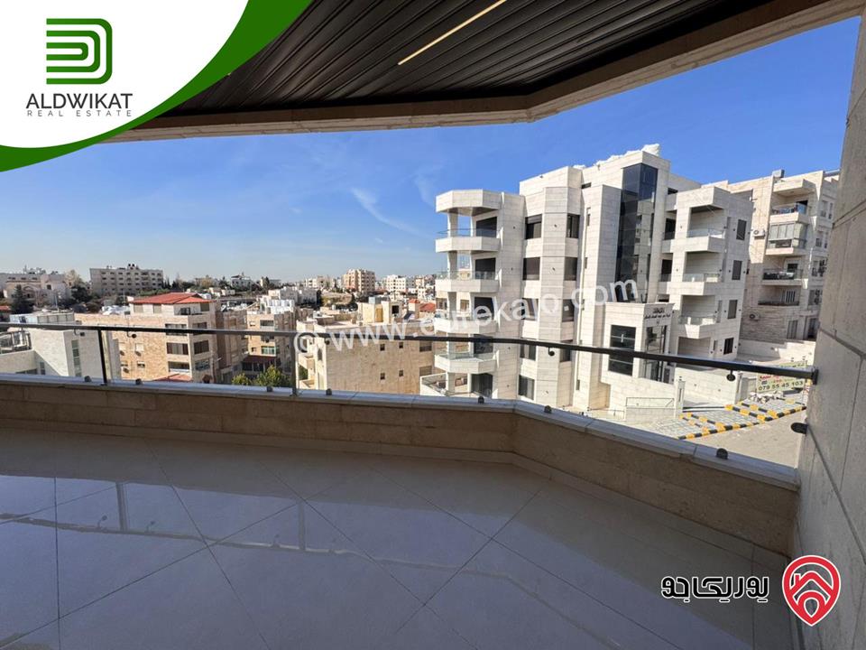 شقة طابقية مع روف للبيع في عمان - تلاع العلي مساحة البناء 260م ومساحة الترس 70م على شارعين