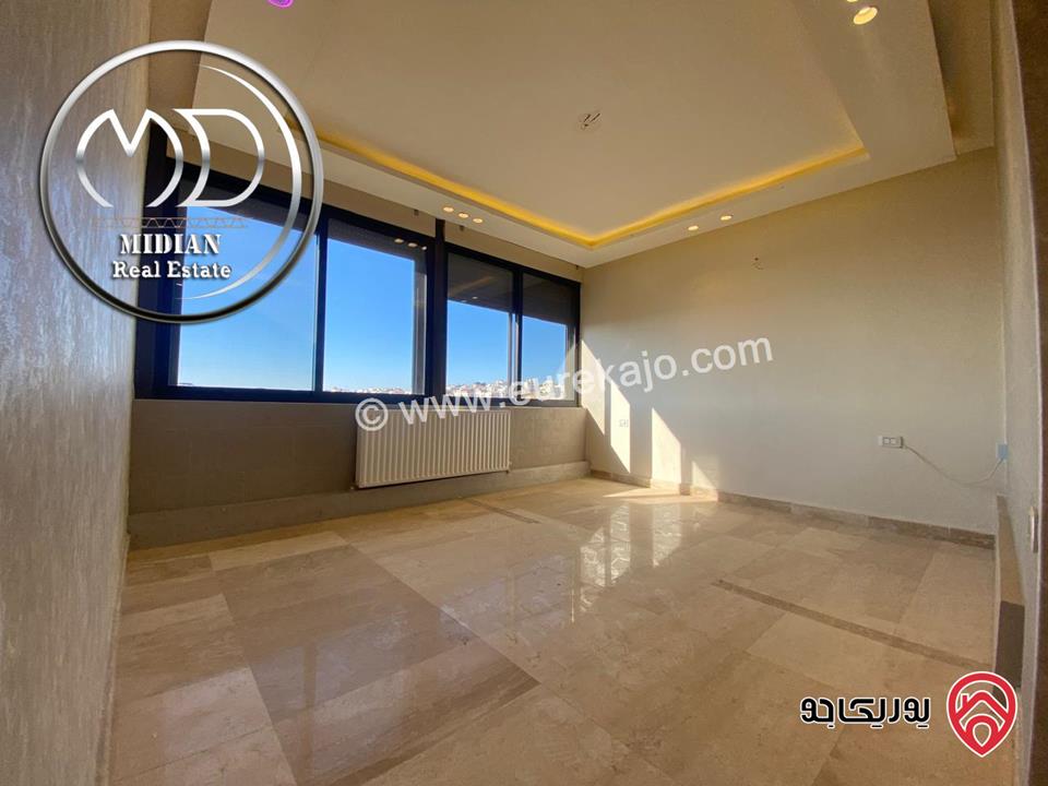 شقة للايجار طابق أخير مع روف في عمان - خلدا - العوجانية مساحة 425م مع تراسات تشطيبات ديكورات فاخرة اطلالة بانورامية خلابة