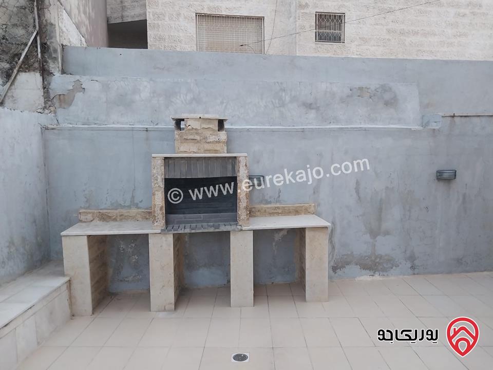 شقه للايجار في عمان - الدوار السابع مساحة 80م + 130م شبه ارضي قرب الترخيص