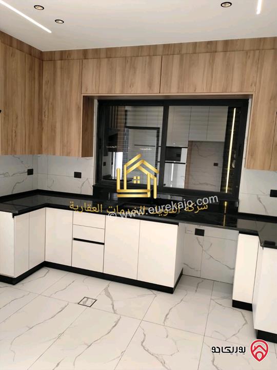 شقة جديدة طابق ثالث مساحة 205متر للإيجار في عمان - خلدا 