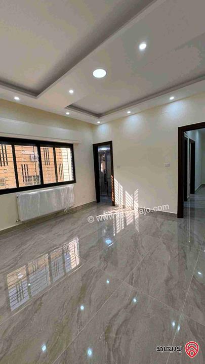 شقة طابق أرضي معلق مساحة 110م للبيع في عمان - الجاردنز