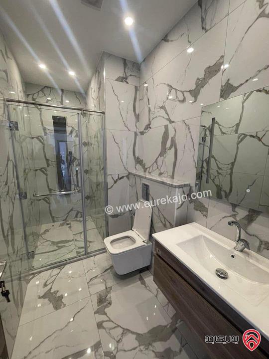 شقة فاخرة جديدة ارضية مساحة 188م داخلي و 90م خارجي للبيع في عمان - الجبيهة