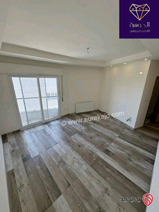 شقة طابق اخير مع روف دوبلكس فاخر مساحة 210م لم يسكن للبيع في عمان - خلدا