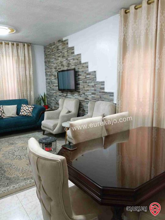 شقة مع روف مساحة 124م للبيع في عمان - الياسمين بالقرب من دوار الصخرة 