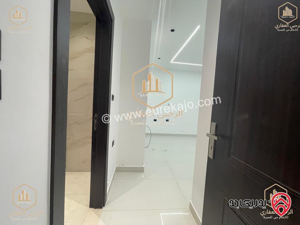 شقة ارضية مساحة 145م مع ترس خارجي 135م للايجار في عمان - الجندويل