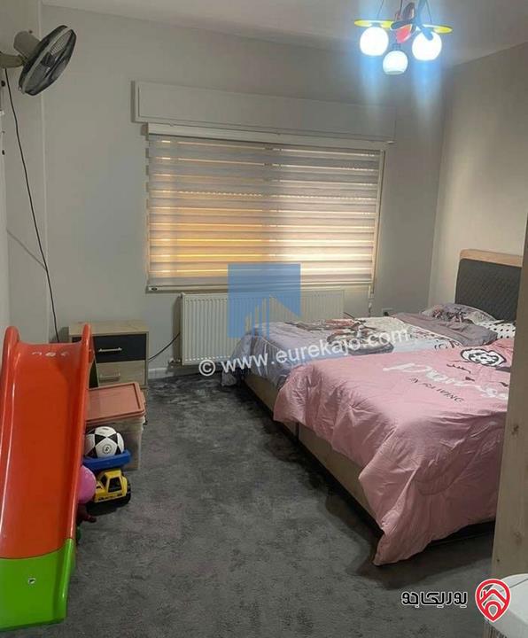 شقة مميزة شبه أرضية مساحة 130م للبيع في عمان - خلدا