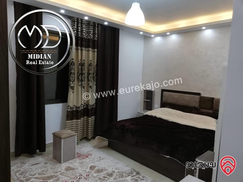 شقة ارضية مفروشة للايجار في عمان - ام السماق مساحة 130م مع ترس 100م تشطيبات و فرش سوبر ديلوكس