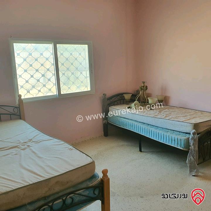 قطعة أرض مساحة 594م عليها بيت طابقين للبيع في البحر الميت جوفة الكفرين 