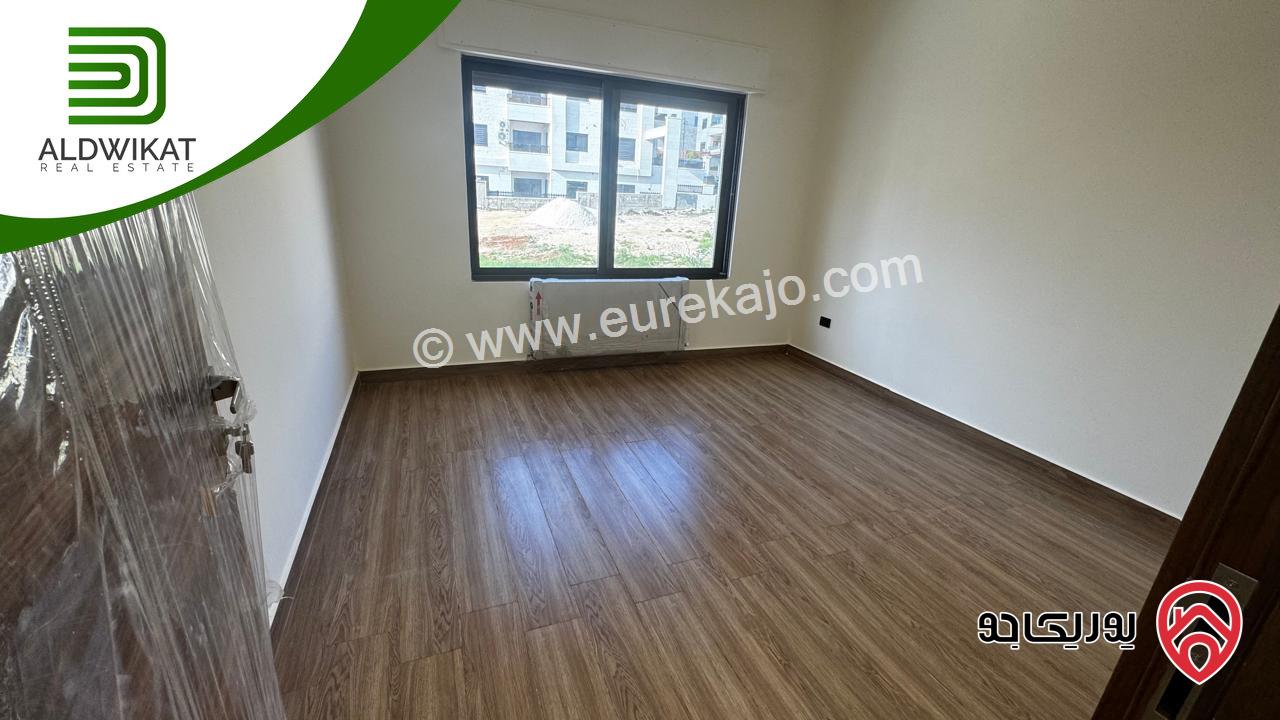 شقة ارضية للبيع في عمان - خلدا مساحة البناء 250 م والترس 80م موقع مميز واطلالة