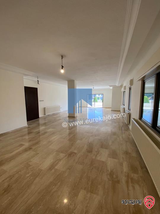 شقة أرضية (شبه فيلا) طابقية فاخرة للبيع في عمان - الرابية قرب الكالوتي 425م مع حديقة وترسات 500م