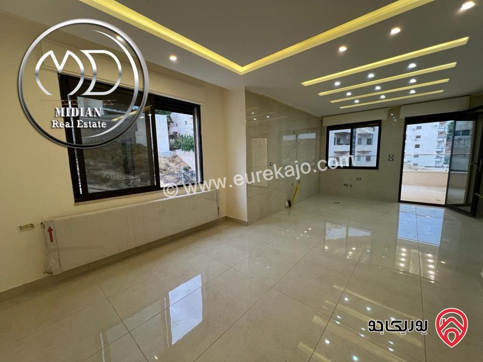 شقة دوبلكس اخير مع روف للبيع في عمان - تلاع العلي مساحة 175م تشطيببات وديكورات سوبر ديلوكس اطلالة جميلة بسعر مميز