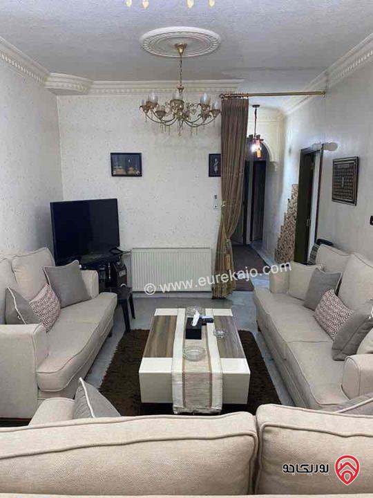 شقة للبيع في عمان- تلاع العلي قرب دوار الواحة طابق ارضي مساحة 120م + 35م