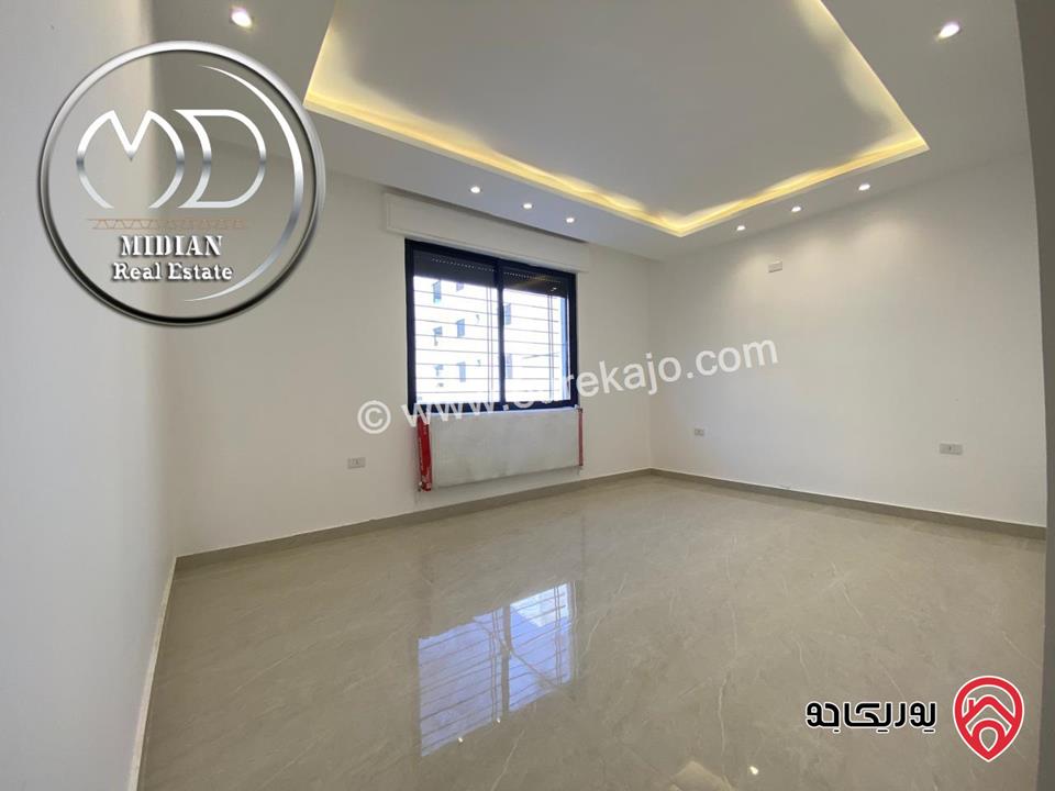 شقق أرضية جديدة للبيع في عمان - خلدا مساحات 140م & 145م مع تراسات و حدائق تشطيبات ديكورات سوبر ديلوكس بسعر مميز