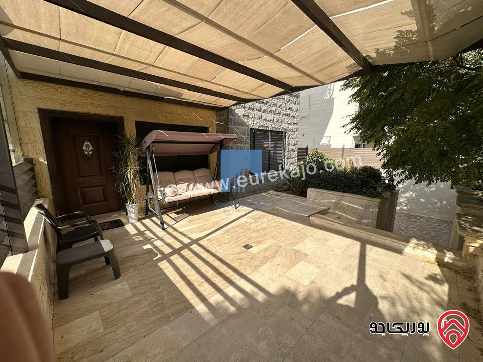 شقة أرضية مميزة للبيع في عمان - الجندويل قرب مركز أمن البيادر 180م مع حديقة وترسات 200م